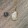 Faden Quartz Crystal Pendant